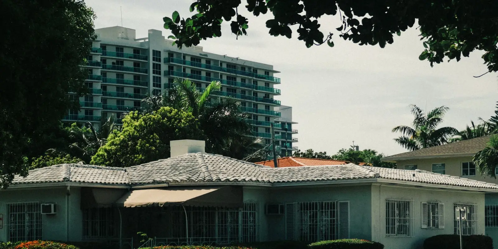 Plumber in Miami: single-story stucco home with a tile roof