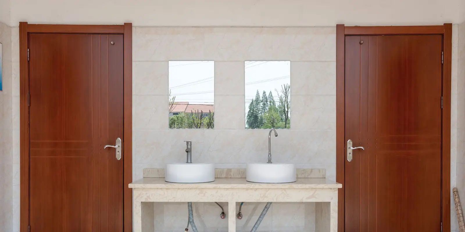 Office plumbing in Miami: office restroom with twin sinks